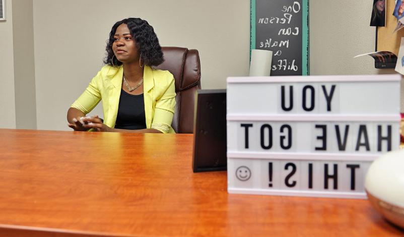 Frankline Tshombe sitting in her office at Families First Counseling